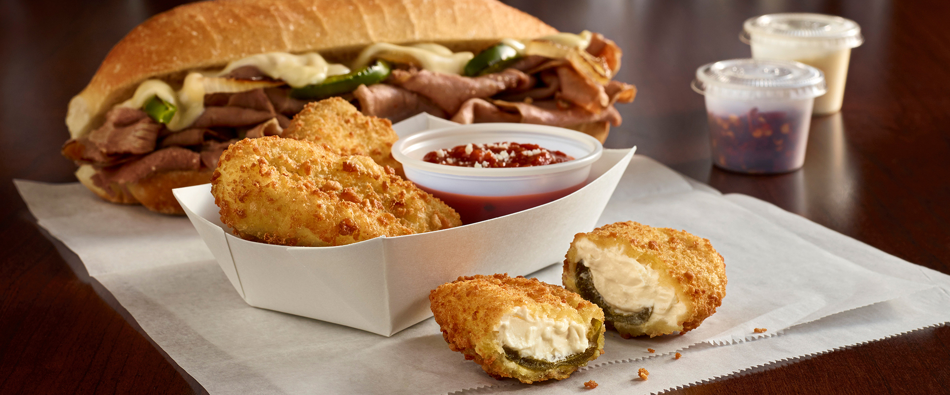 Pizza Steak Grinder and Poppers