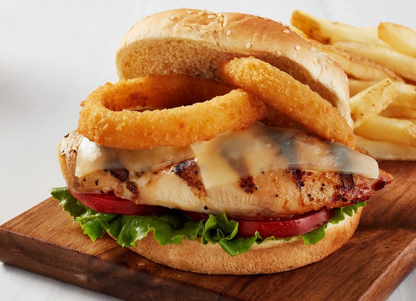Breaded Onion Ring Topped Grilled Chicken Sandwich